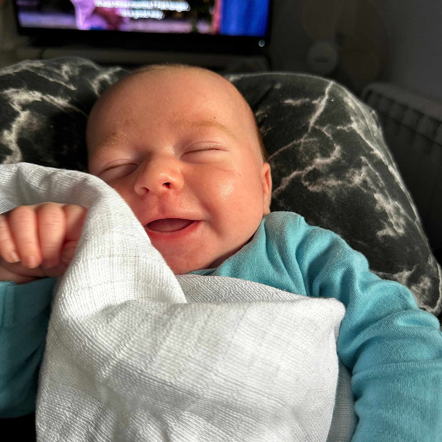 Oakley joined the competition — help win amazing prizes! adult, baby, blanket, bodypart, computerhardware, electronics, face, female, finger, hand, hardware, head, monitor, newborn, person, photography, portrait, screen, tv, woman