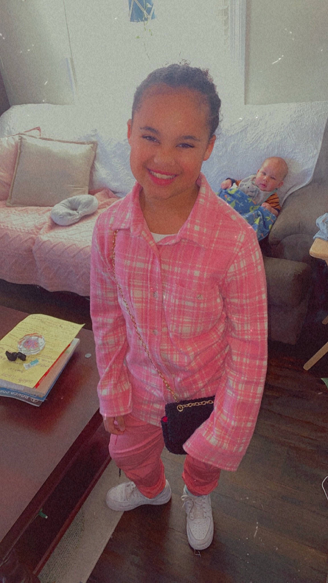 Kira is registered to the contest to win money with this photo: cool, eye, face, flooring, hair, hairstyle, happy, head, joint, joy, knee, mouth, neck, person, pink, shoulder, skin, sleeve, smile, standing