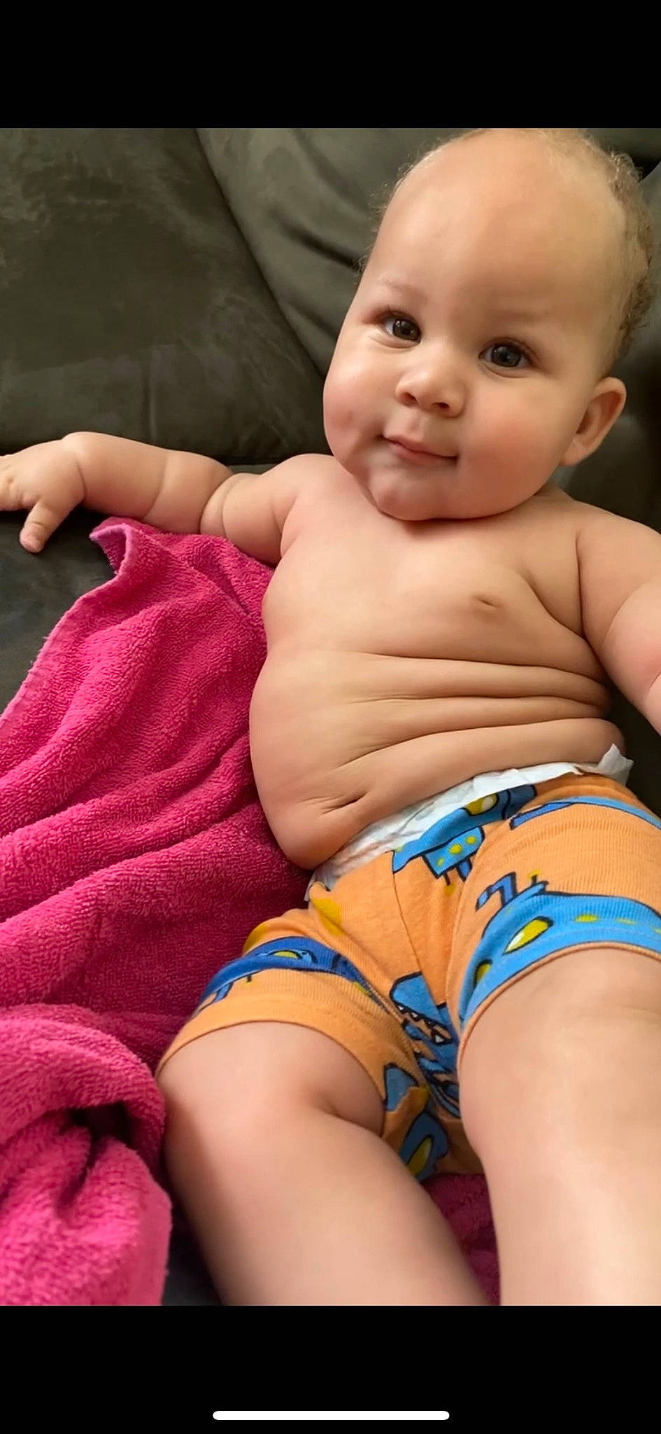 Kyrie is registered to the contest to win money with this photo: arm, cheek, chin, eye, face, facial_expression, hairstyle, hand, head, human_body, joint, mouth, muscle, neck, person, shoulder, skin, smile, standing, stomach