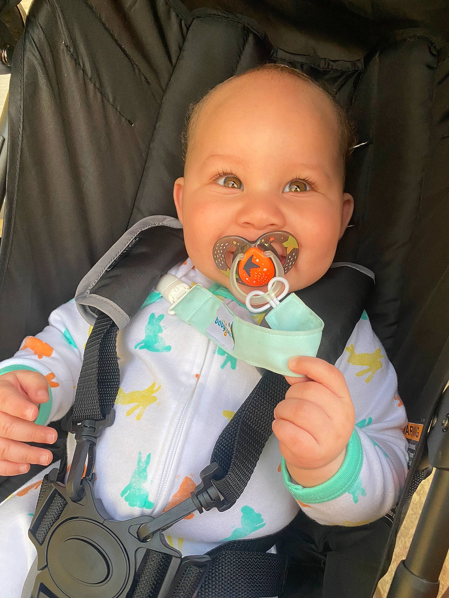 Kyrie joined the competition — help win amazing prizes! baby, baby_carriage, baby_in_car_seat, baby_products, baby_safety, baby_toddler_clothing, car_seat, cheek, child, comfort, finger, fun, person, personal_protective_equipment, product, sitting, skin, sleeve, toddler