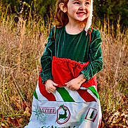 Harper joined the competition — help win amazing prizes! bag, child, clothing, coat, dress, face, female, girl, grass, happy, head, herbal, herbs, outdoors, person, photography, plant, portrait, smile, vegetation