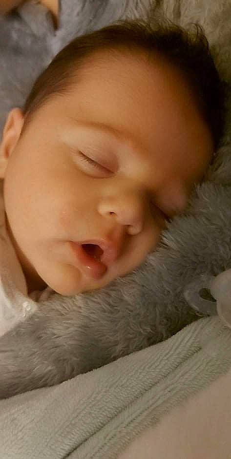 Milann participe au concours pour gagner de l'argent avec cette photo : baby, bedtime, cheek, comfort, ear, eye, eyelash, hair, happy, head, iris, lip, mammal, mouth, nose, person, skin, smile, textile, toddler