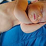 Jaxson joined the competition — help win amazing prizes! baby, newborn, sleeping, skin, arm, diaper, person, blue_clothing, necklace, closeup, peaceful, resting, human, infant, portrait, soft_light, relaxation, cuddling, face, body