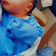 Jaxson joined the competition — help win amazing prizes! baby, sleeping, newborn, blue_clothing, blanket, striped_blanket, wooden_chair, infant, peaceful, resting, indoor, person, child, cozy, portrait, cute, soft_lighting, home, casual, human