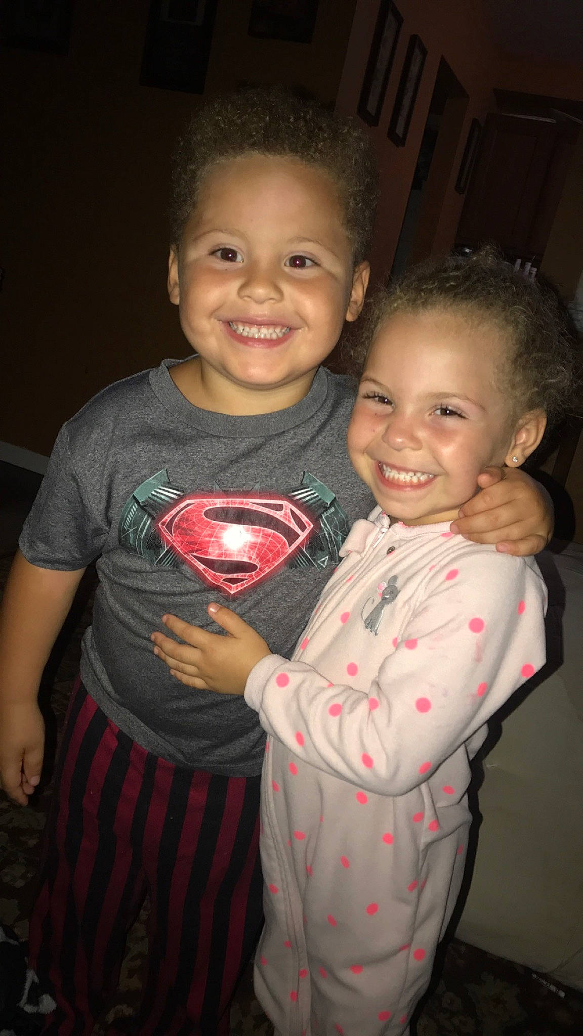 Jaxon is registered to the contest to win money with this photo: cheek, child, face, family, fun, happy, head, hug, iris, joy, people, person, sibling, skin, smile, standing, toddler, tooth