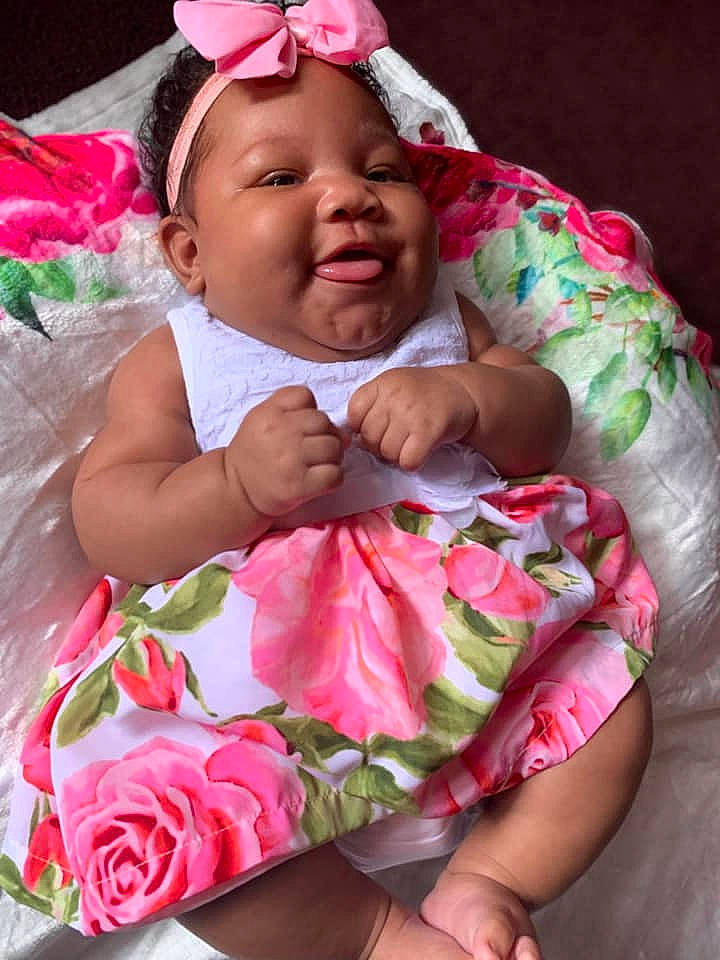 Charlotte joined the competition — help win amazing prizes! baby, baby_products, baby_toddler_clothing, birth, child, flower, hair_accessory, headgear, headwear, person, petal, pink, plant, product, rose, skin, smile, textile, toddler