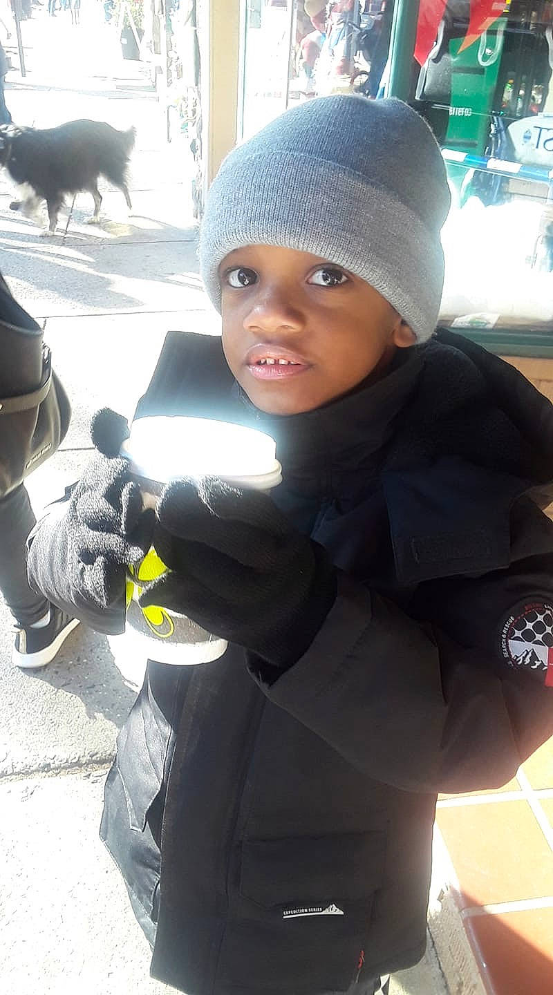 Torin is registered to the contest to win money with this photo: baby, black_hair, cap, child, headgear, headwear, person, photography, smile, toddler, vacation