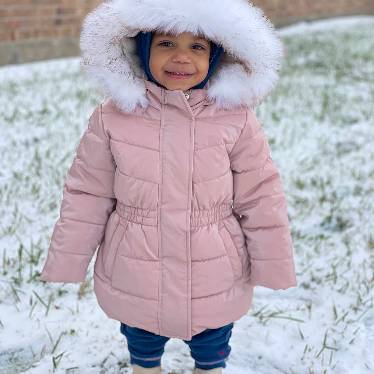 Kyeleigh is registered to the contest to win money with this photo: child, clothing, coat, face, female, girl, happy, hat, head, hood, hoodie, jacket, nature, outdoors, person, photography, portrait, smile, snow, standing