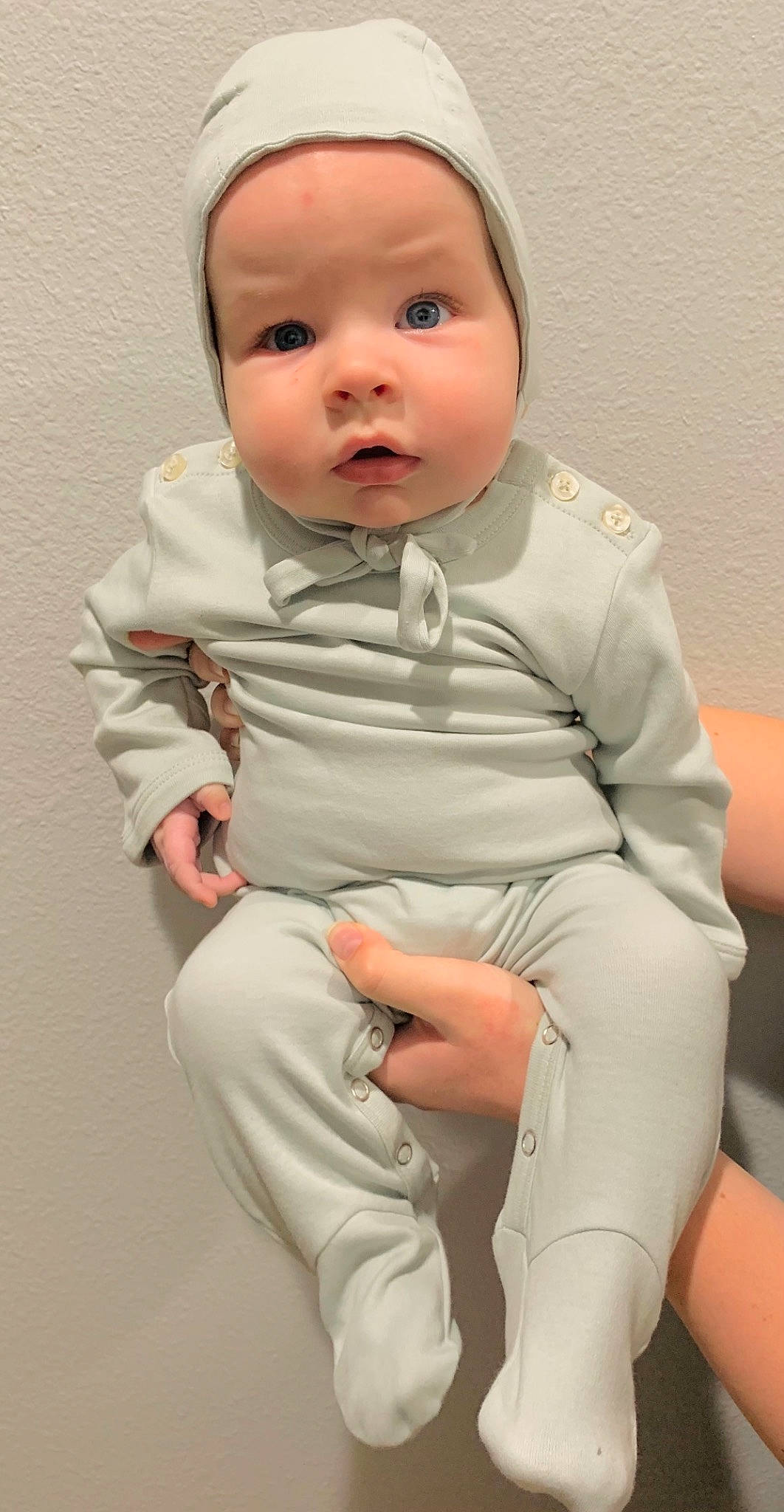 Dash is registered to the contest to win money with this photo: baby, baby_toddler_clothing, cheek, child, child_model, comfort, finger, joint, lap, peach, person, portrait_photography, skin, sleeve, sock, thigh, toddler