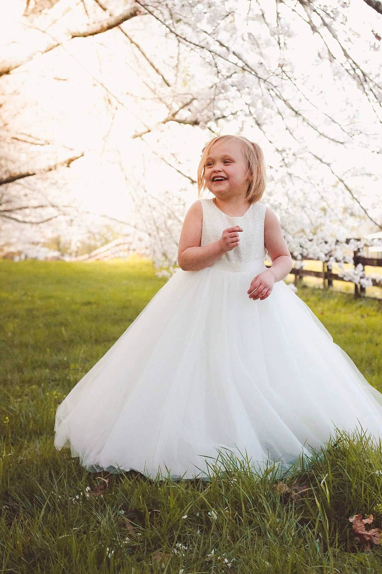 Emma-kate Davis is registered to the contest to win money with this photo: a_line, beauty, blond, bridal_clothing, bridal_party_dress, bride, ceremony, child, clothing, dress, flower_girl, gown, grass, happy, joy, people_in_nature, person, photograph, photography, portrait