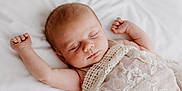Ava-Mae is registered to the contest to win money with this photo: arm, baby, calm, closeup, cozy, cute, delicate, face, head, infant, lace, newborn, peaceful, portrait, relaxation, rest, skin, sleeping, soft_light, white_background