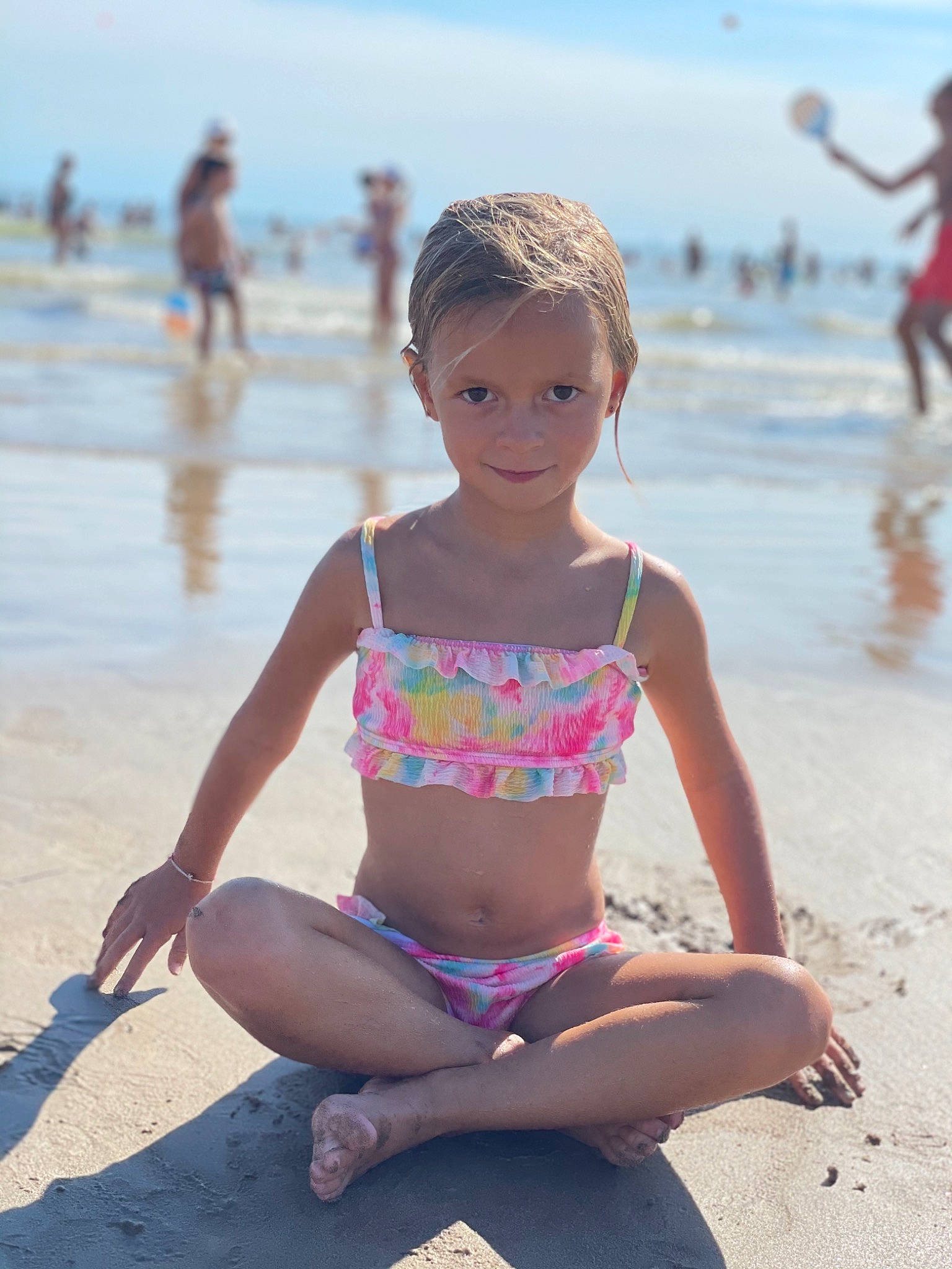 Claire participe au concours pour gagner de l'argent avec cette photo : azure, barefoot, beach, brassiere, fun, happy, human, joy, leg, leisure, morning, people_on_beach, person, sand, sky, summer, swimsuit_top, swimwear, thigh, toddler