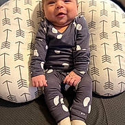 Michael joined the competition — help win amazing prizes! baby, smiling, pajamas, socks, pillow, patterned_pillow, arrows_pattern, ghost_prints, infant, indoor, cute, happy, child, seated, cozy, soft_fabric, hands, face, young_child, portrait