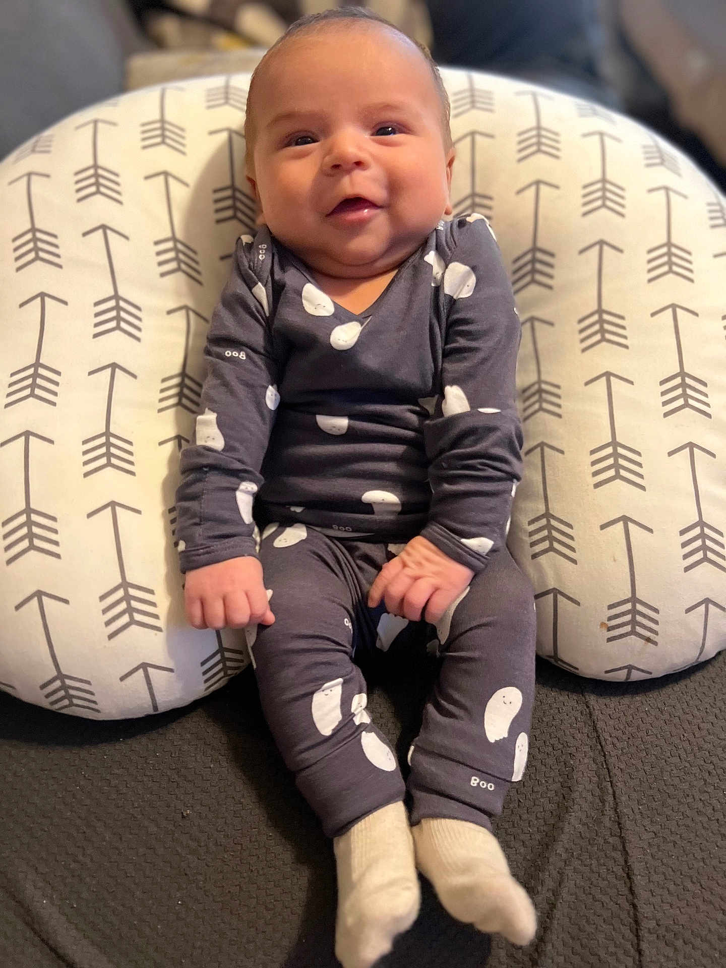 Michael joined the competition — help win amazing prizes! baby, smiling, pajamas, socks, pillow, patterned_pillow, arrows_pattern, ghost_prints, infant, indoor, cute, happy, child, seated, cozy, soft_fabric, hands, face, young_child, portrait