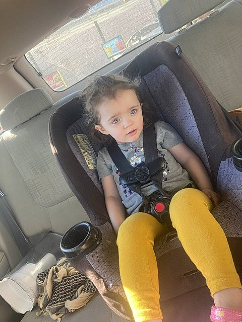 Ashlyn is registered to the contest to win money with this photo: air_travel, auto_part, automotive_design, automotive_exterior, car_seat, car_seat_cover, comfort, family_car, head_restraint, human_leg, leg, motor_vehicle, person, seat_belt, sitting, steering_part, steering_wheel, thigh, toddler, vehicle