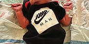 Charles joined the competition — help win amazing prizes! newborn, baby, infant, sleeping, onesie, clothing, hospital, blanket, remote_control, medical, wristband, feet, hands, bed, cute, peaceful, resting, person, indoors, soft
