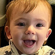 Ellie joined the competition — help win amazing prizes! baby, child, smiling, face, eyes, jacket, white, floral_pattern, happy, cute, portrait, young, infant, expression, mouth_open, skin, hair, indoors, person, zipper