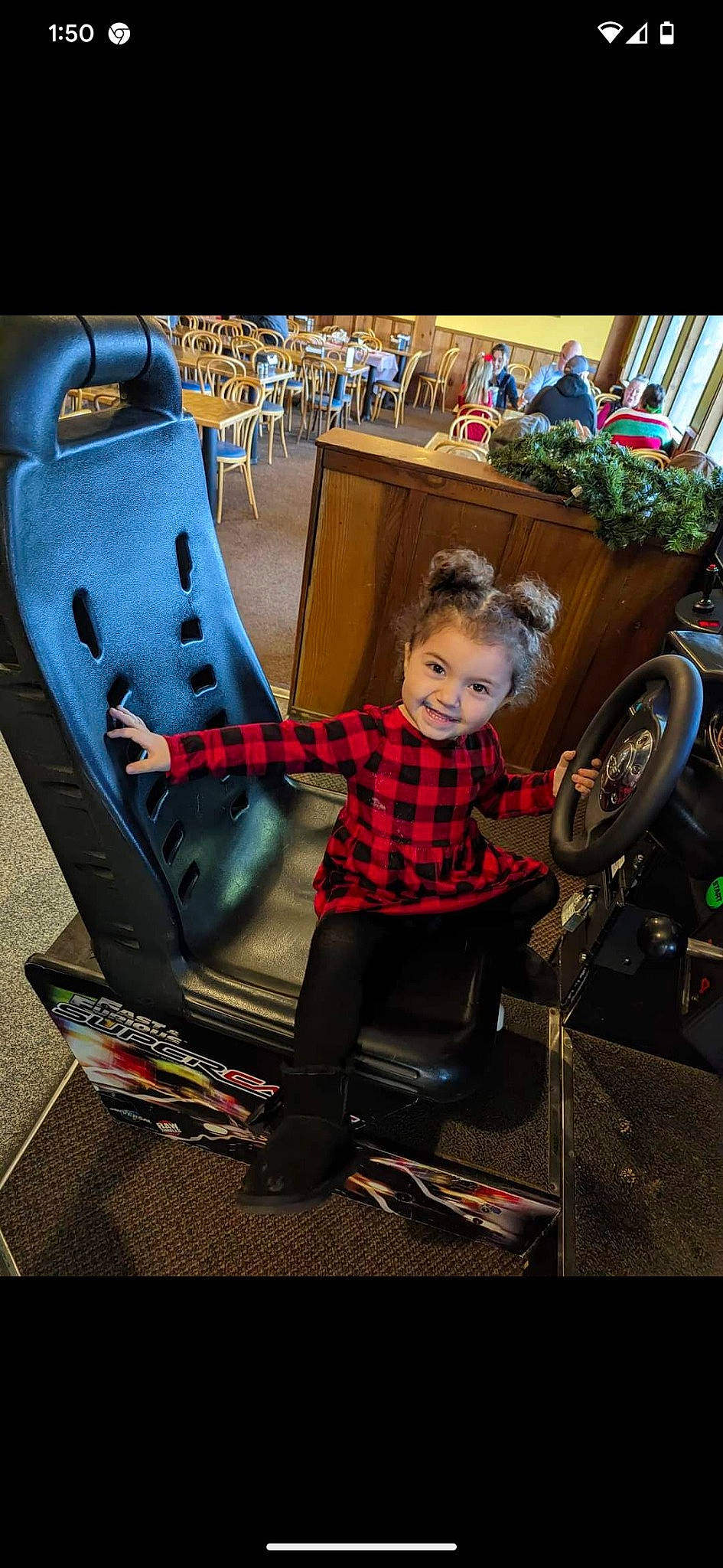 Paisley joined the competition — help win amazing prizes! automotive_design, chair, child, city, event, fun, holiday, human_leg, joy, leisure, pattern, person, product, recreation, shoe, sitting, tire, toddler, toy, tree