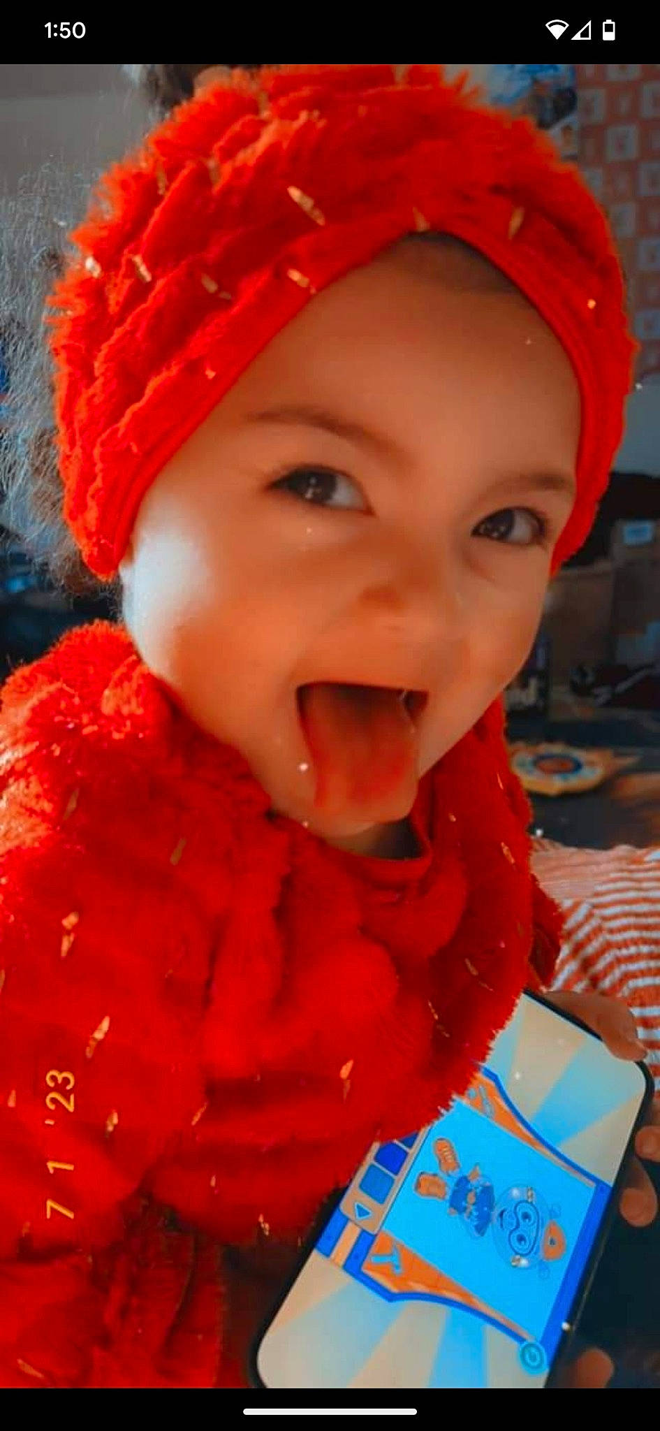 Paisley joined the competition — help win amazing prizes! cap, cheek, child, chin, eye, face, facial_expression, fun, happy, hat, head, headgear, headwear, lip, mouth, nose, orange, organ, person, red