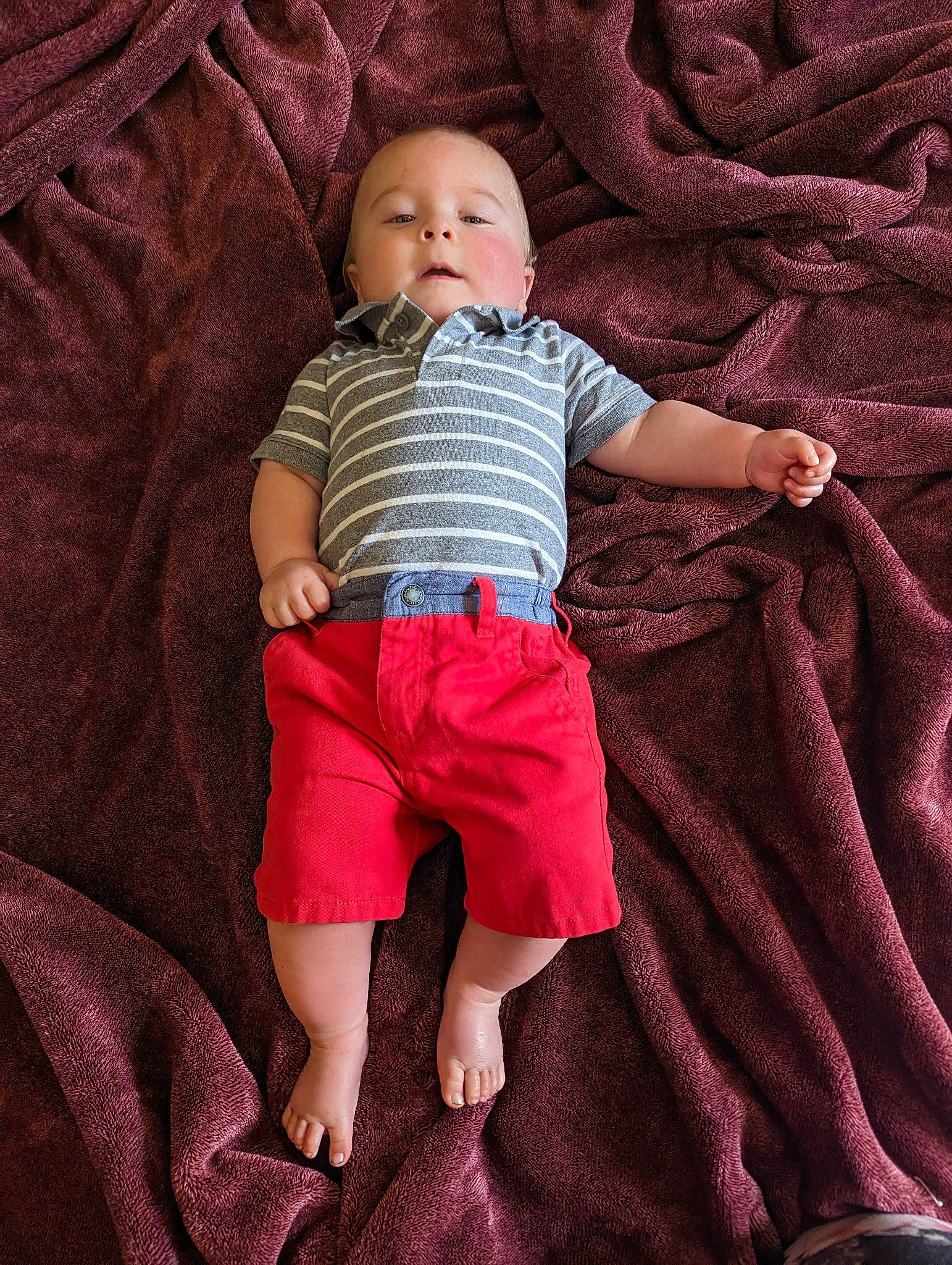 Axel joined the competition — help win amazing prizes! baby, baby_toddler_clothing, child, comfort, eye, head, human_leg, leg, linens, magenta, pattern, person, pink, purple, skin, sleeve, t_shirt, textile, thigh, toddler