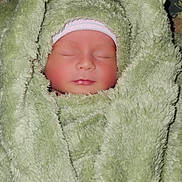 Chrysliz Aiyah joined the competition — help win amazing prizes! baby, newborn, sleeping, blanket, soft, cozy, wrapped, infant, face, peaceful, warm, headwear, cute, portrait, resting, child, human, skin, closed_eyes, comfort