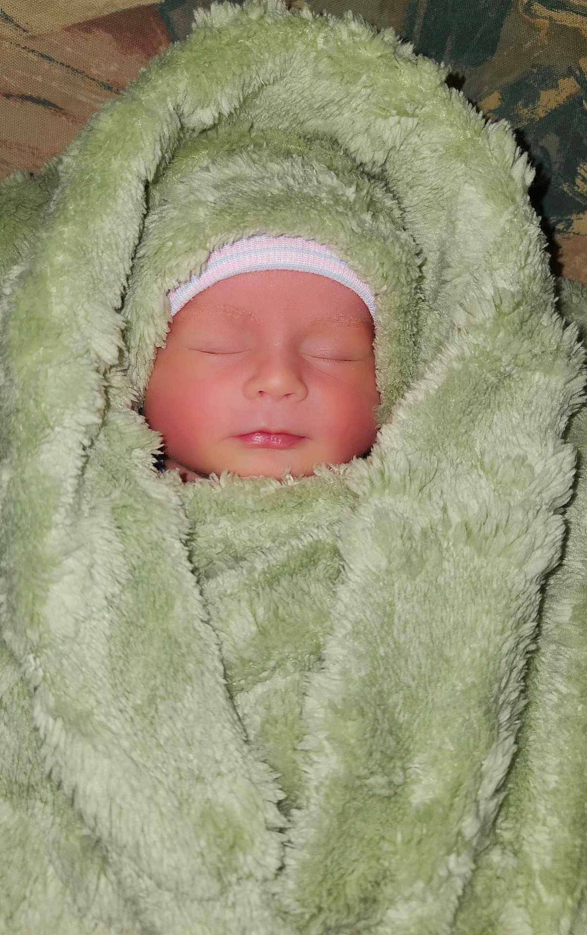Chrysliz Aiyah joined the competition — help win amazing prizes! baby, newborn, sleeping, blanket, soft, cozy, wrapped, infant, face, peaceful, warm, headwear, cute, portrait, resting, child, human, skin, closed_eyes, comfort