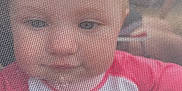 Amelia joined the competition — help win amazing prizes! baby, child, face, mesh, screen, closeup, curious, indoors, clothing, red, white, pattern, portrait, expression, texture, head, eyes, babywear, cute, young
