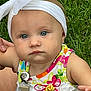 baby, child, headband, blue_eyes, outdoor, grass, colorful_dress, clip, cute, portrait, infant, summer, flower_pattern, white_headband, closeup, person, young_child, nature, skin, hand