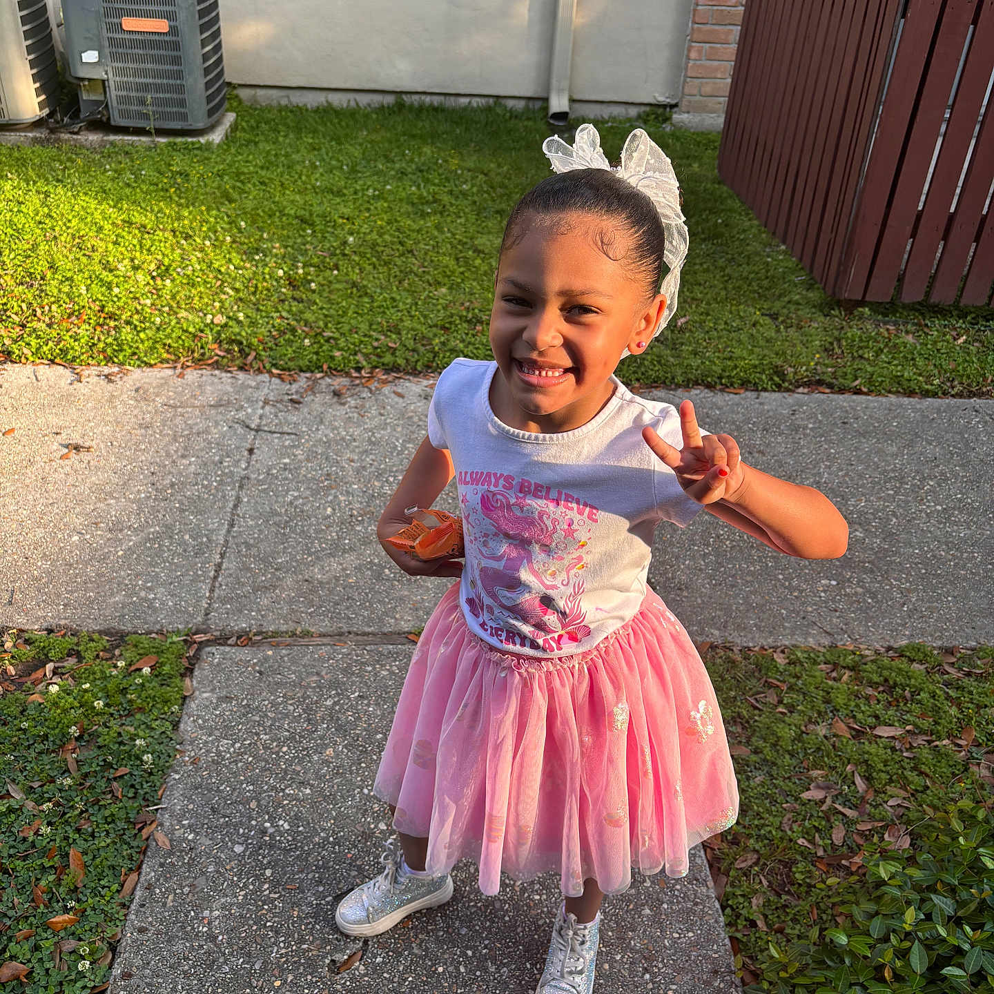 Jaya joined the competition — help win amazing prizes! backyard, child, clothing, dress, face, female, girl, grass, head, nature, outdoors, path, person, photography, plant, portrait, sidewalk, skirt, walkway, yard