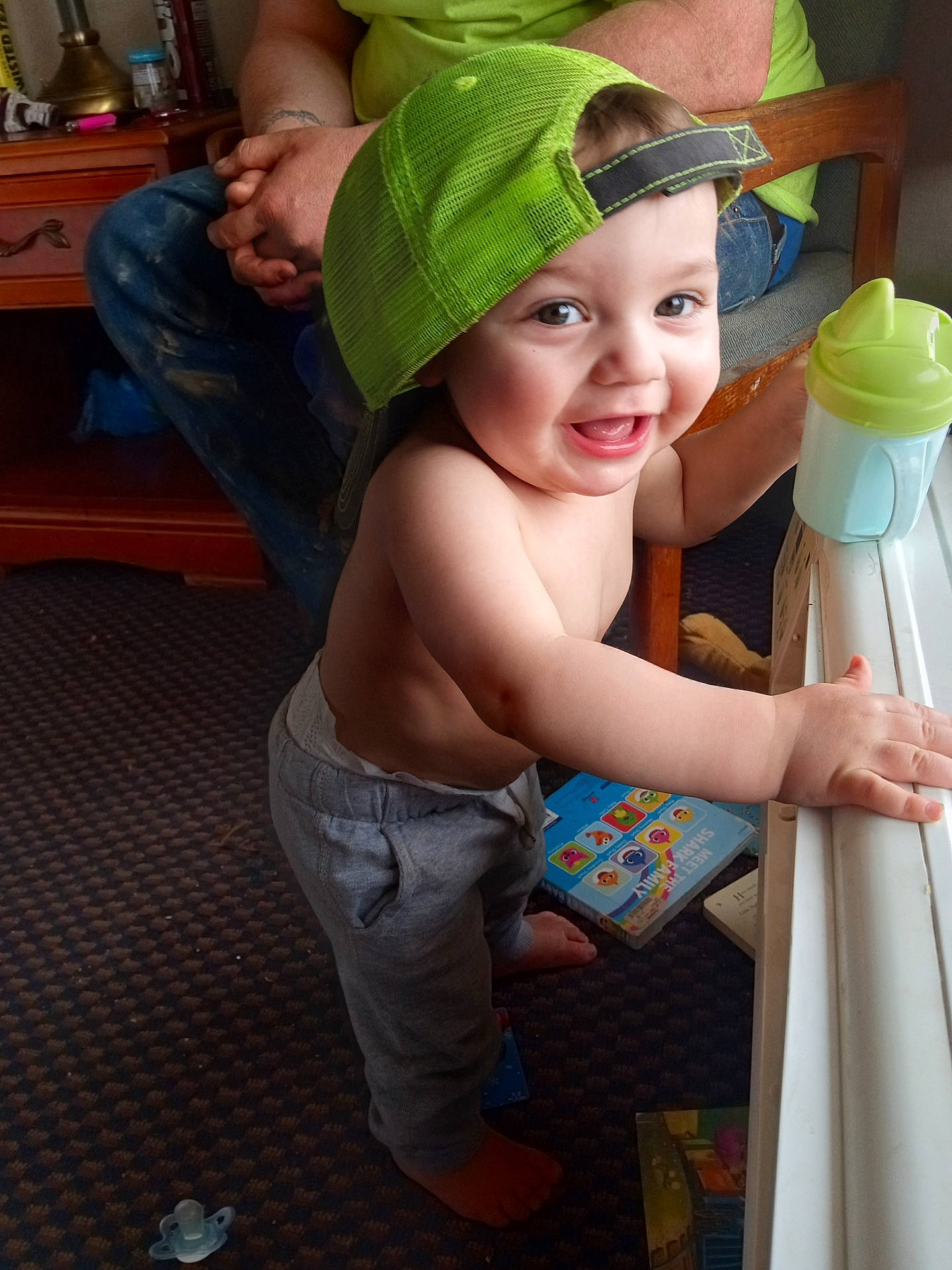 Jackson joined the competition — help win amazing prizes! baby, baseballcap, bodypart, bottle, cap, clothing, couch, face, finger, furniture, hand, hat, head, jeans, pants, person, photography, portrait, sunhat, wood