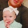 Ruby-Rose is registered to the contest to win money with this photo: baby, woman, smile, headband, bow, indoor, portrait, happy, child, person, clothing, face, cute, holding, family, skin, hair, eyes, casual, together