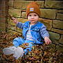 Nathaniel joined the competition — help win amazing prizes! toddler, child, autumn, leaves, beanie, denim_jacket, stone_wall, outdoor, curious, sitting, white_shoes, striped_shirt, fall, nature, casual_clothing, baby, playful, seasonal, cute, explorer