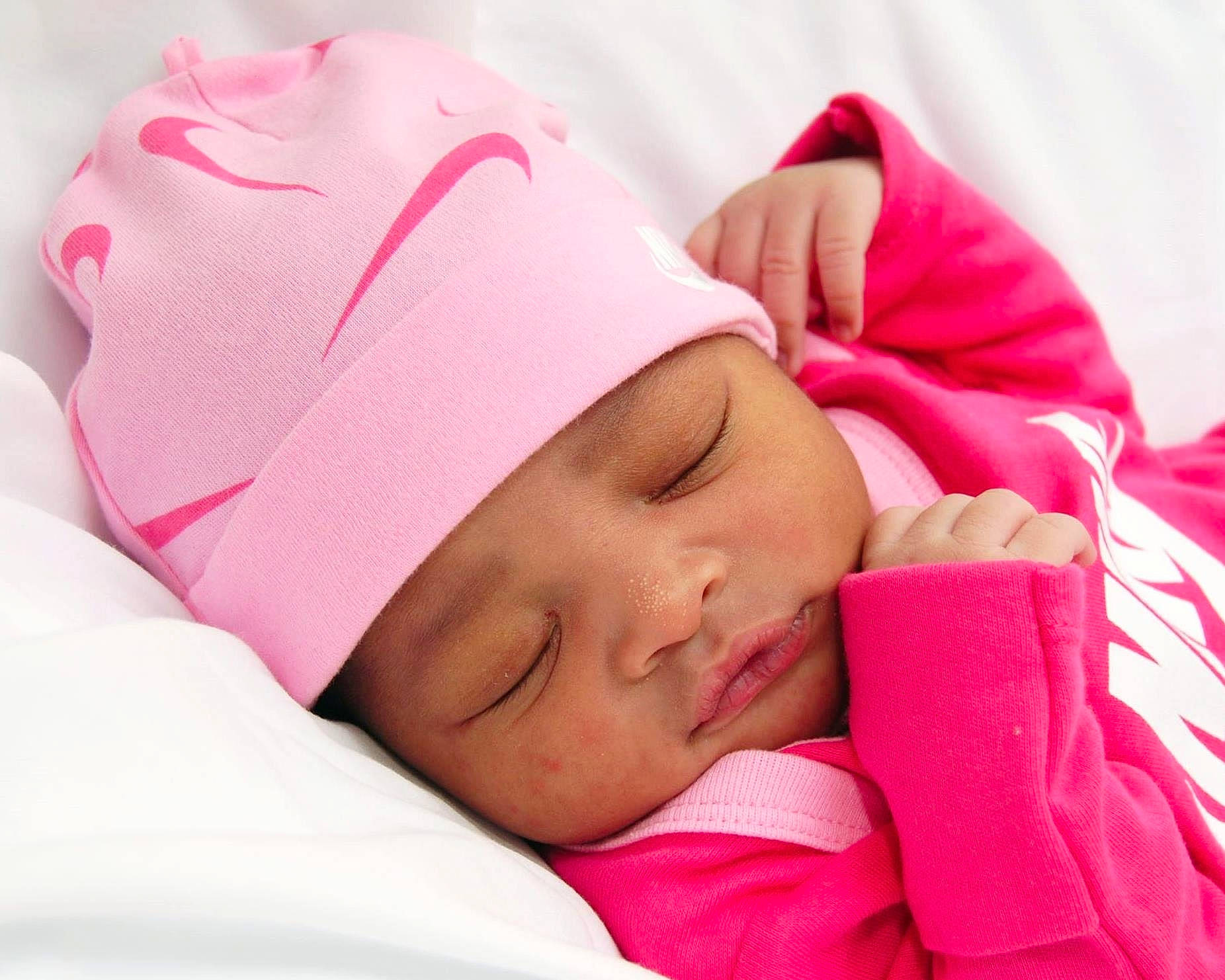 Neilani joined the competition — help win amazing prizes! baby, baby_sleeping, baby_toddler_clothing, bedtime, cap, carmine, cheek, child, comfort, eyelash, fashion_accessory, happy, headwear, linens, lip, magenta, nap, person, pink, skin