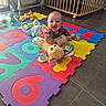 élouan a rejoint le concours — aidez-le/la à gagner de superbes lots ! baby, child, clothing, colorful, crib, face, floor, foam_tiles, happy, indoor, infant, mirror_toy, pillow, playing, playmat, plush_toy, portrait, smiling, toys, tummy_time