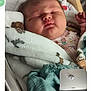 Bailey is registered to the contest to win money with this photo: newborn, baby, blanket, sleeping, crib, hospital, infant, face, bed, clothing, pile, room, window, curtains, light, ceiling, soft, wrapped, peaceful, indoor