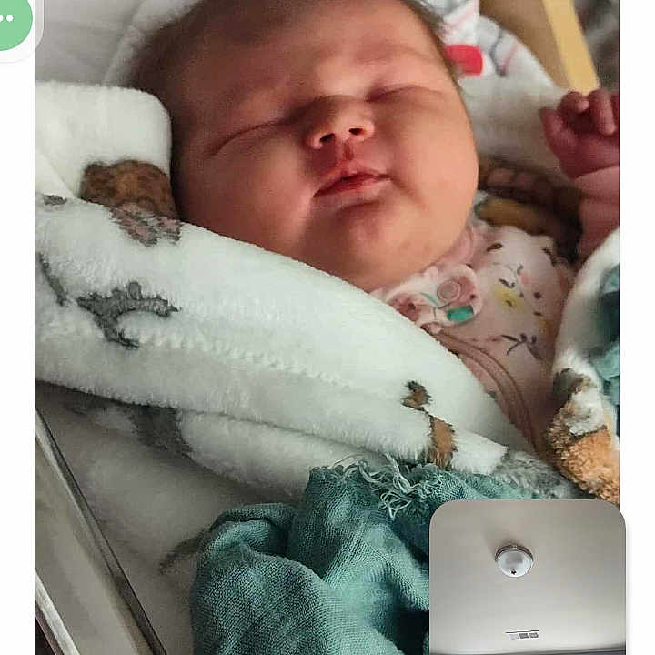 Bailey is registered to the contest to win money with this photo: baby, bed, blanket, ceiling, clothing, crib, curtains, face, hospital, indoor, infant, light, newborn, peaceful, pile, room, sleeping, soft, window, wrapped