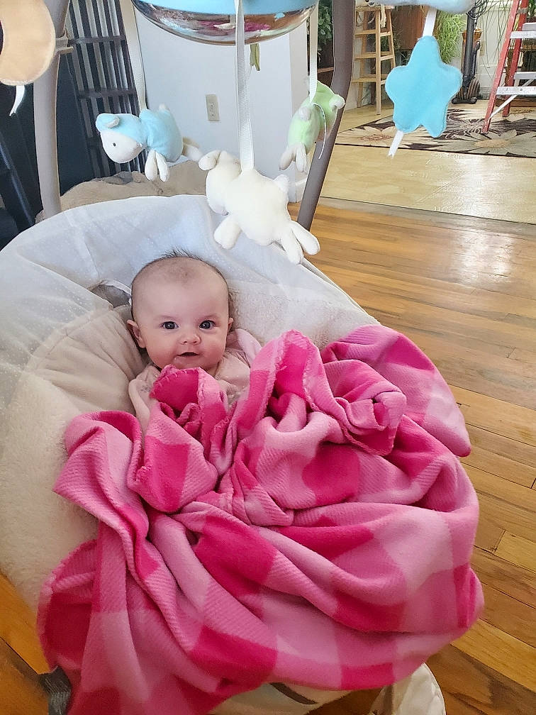 Jaide is registered to the contest to win money with this photo: baby, baby_products, baby_safety, baby_sleeping, baby_toddler_clothing, bedding, chair, child, comfort, floor, flooring, hardwood, linens, magenta, person, petal, pink, room, toddler, white