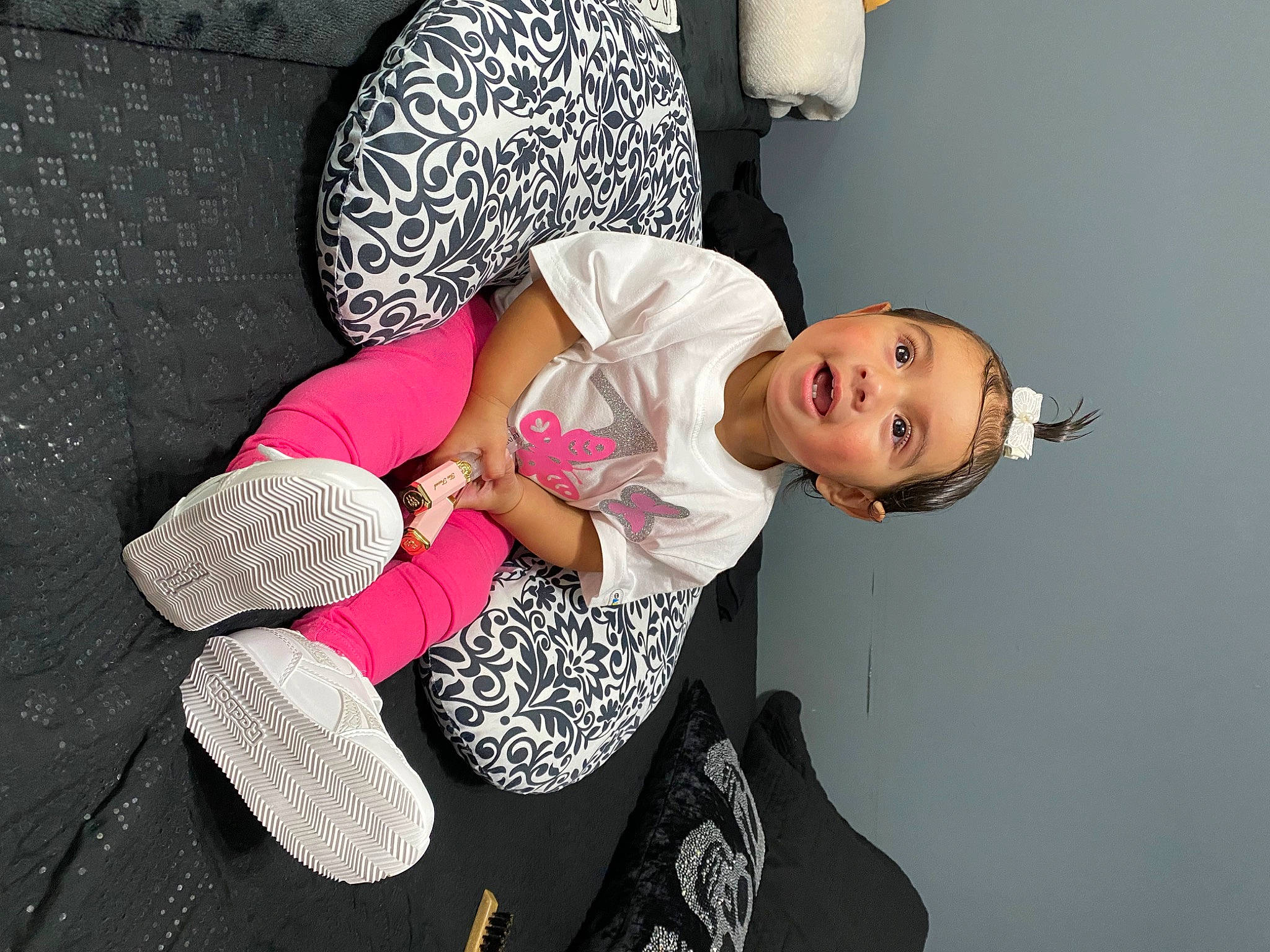 Alyssa is registered to the contest to win money with this photo: baby, baby_toddler_clothing, comfort, elbow, fashion_design, finger, flash_photography, happy, human_body, human_leg, joint, knee, leg, person, sitting, sleeve, textile, thigh, toddler, trunk