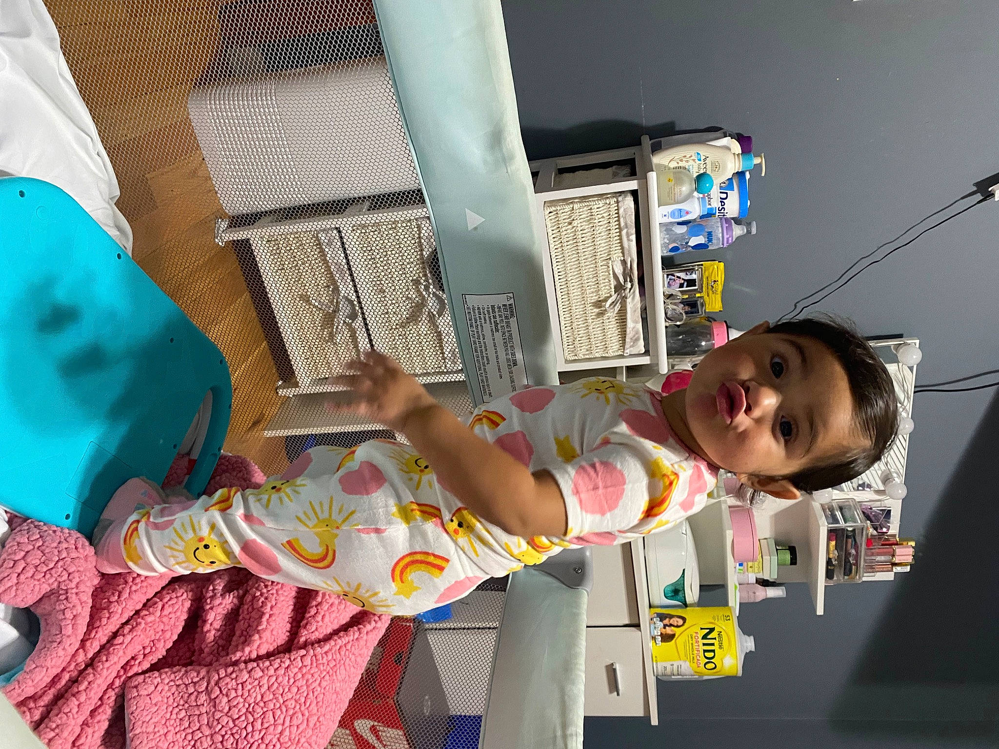 Alyssa is registered to the contest to win money with this photo: baby, baby_toddler_clothing, child, fun, happy, leisure, linens, pattern, person, play, room, smile, surprise, toddler, world, yellow