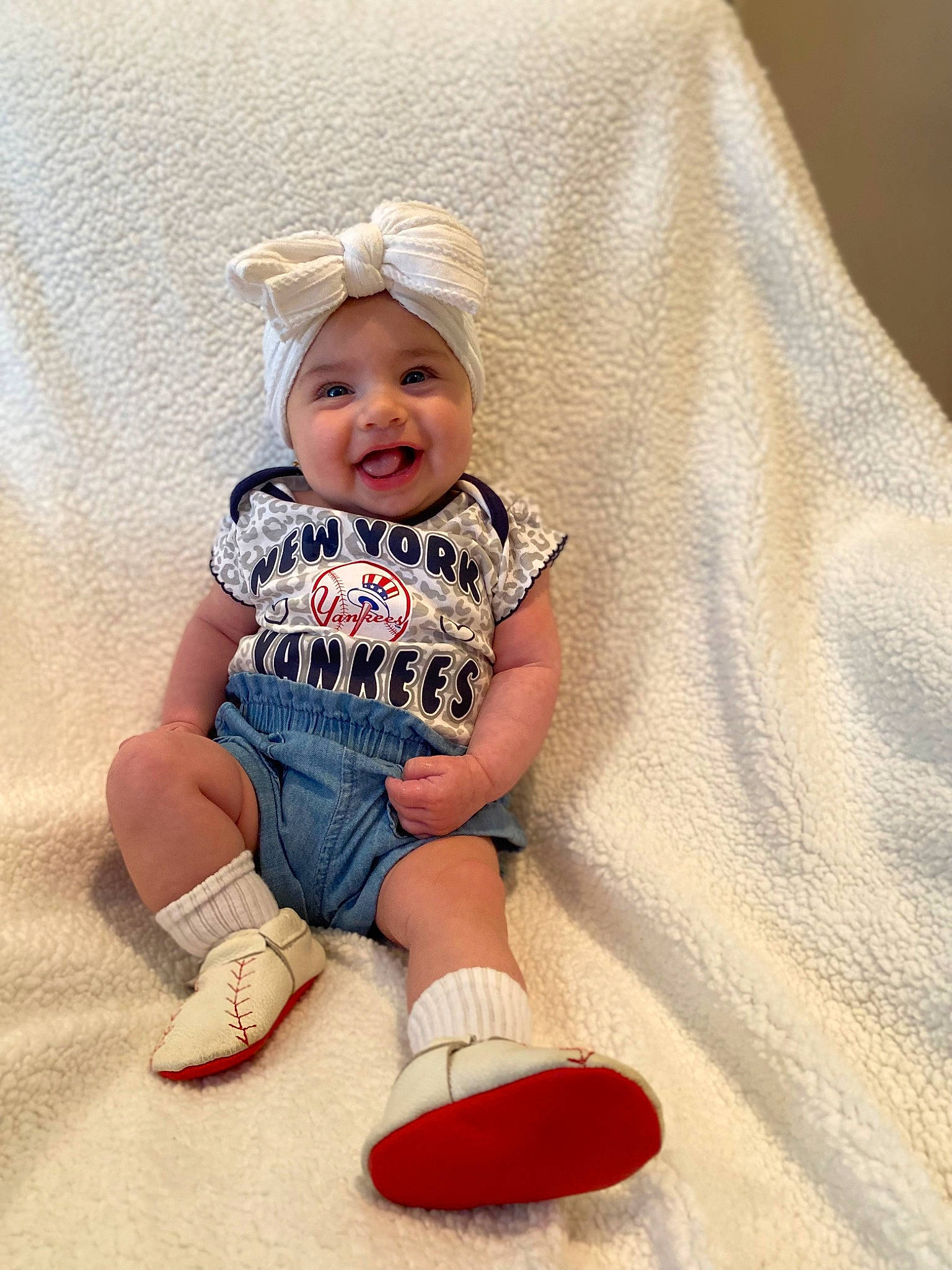 Alivia joined the competition — help win amazing prizes! baby, baby_toddler_clothing, child, comfort, facial_expression, fashion_accessory, fun, happy, headwear, human_leg, joy, knee, pattern, person, shorts, sitting, skin, sleeve, smile, sock