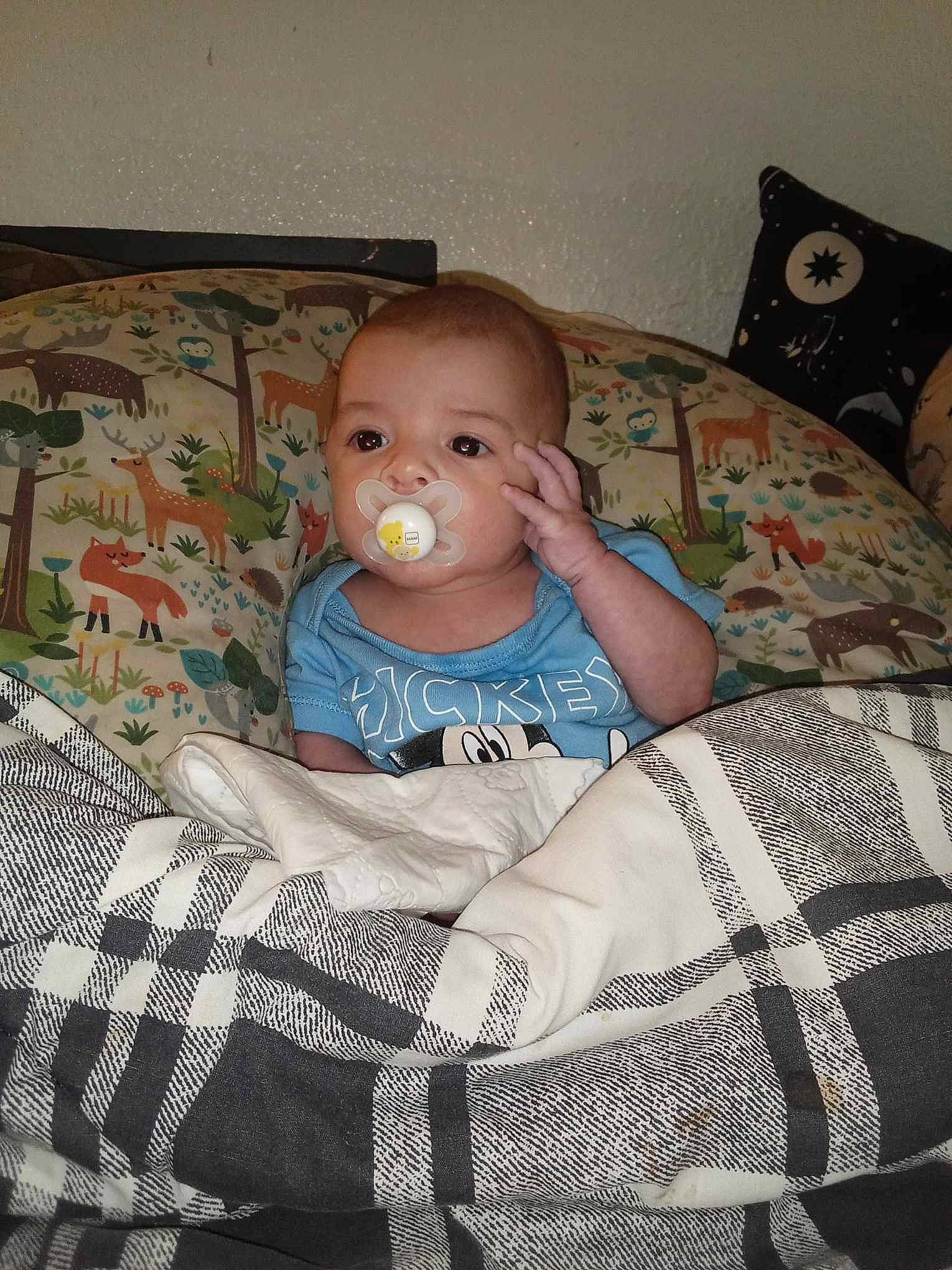 Raven joined the competition — help win amazing prizes! baby, baby_products, baby_toddler_clothing, bedding, chair, cheek, child, comfort, couch, eye, flooring, head, iris, lap, linens, pattern, person, room, sitting, toddler