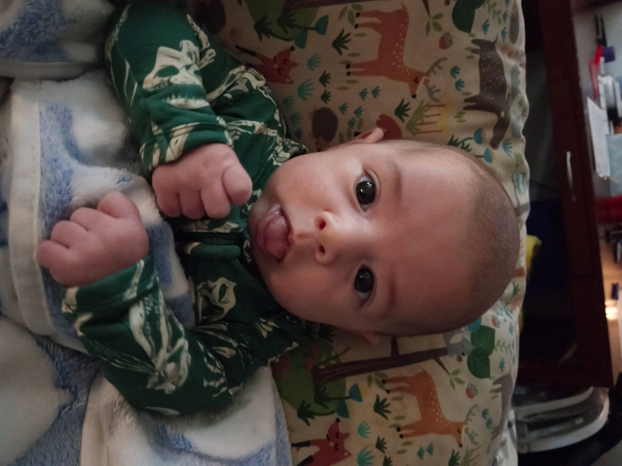 Raven joined the competition — help win amazing prizes! baby, baby_toddler_clothing, cheek, child, chin, eye, eyelash, gesture, hand, human_body, iris, military_camouflage, mouth, nose, person, sitting, skin, sleeve, thumb, toddler