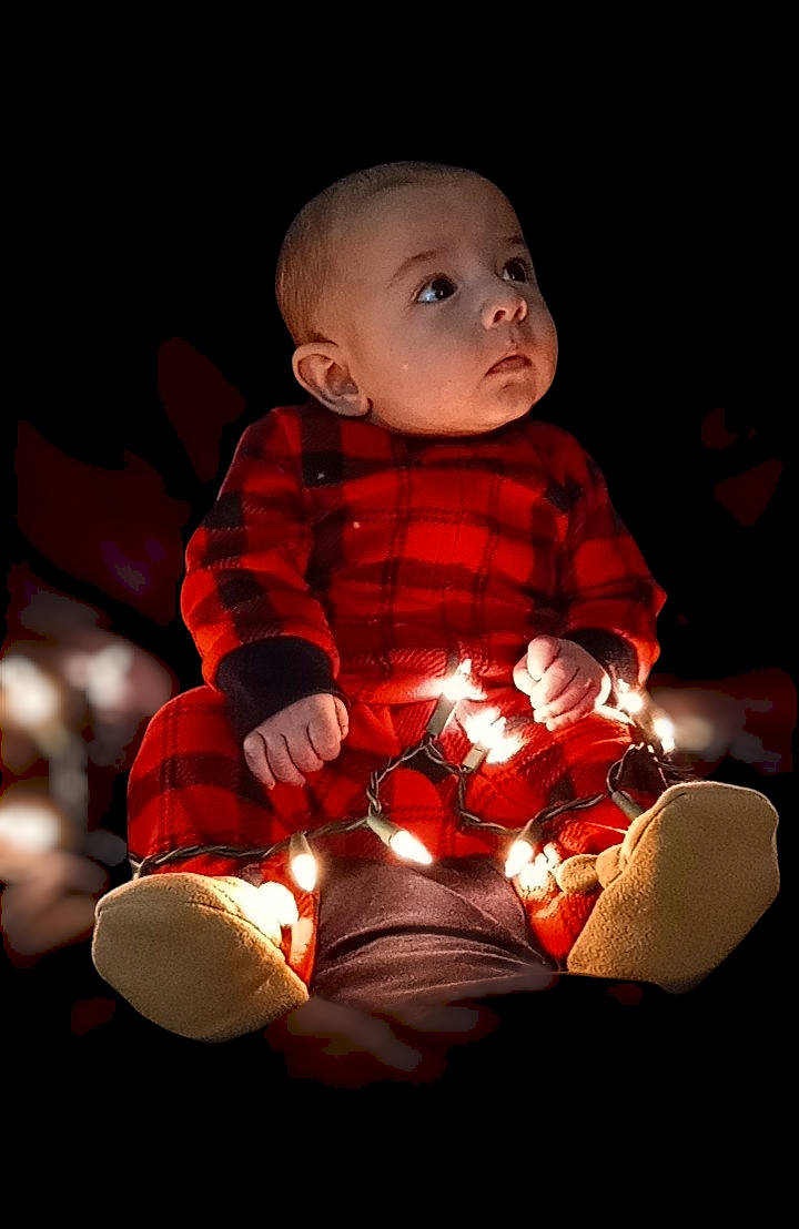 Raven is registered to the contest to win money with this photo: baby, baby_toddler_clothing, carmine, child, christmas, darkness, doll, event, fictional_character, flash_photography, fun, holiday, lap, orange, person, sitting, sleeve, stuffed_toy, teddy_bear, toddler