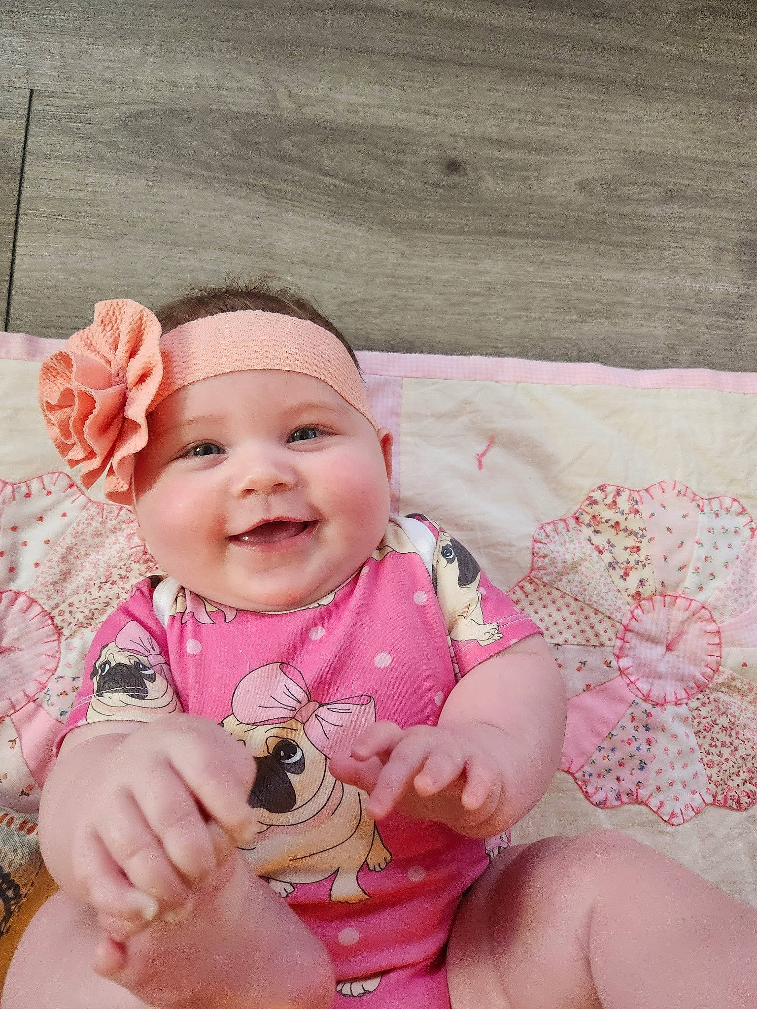 Bayleigh joined the competition — help win amazing prizes! baby, baby_toddler_clothing, cheek, comfort, dress, eye, finger, gesture, hand, happy, head, headwear, human_body, joy, lip, mouth, nail, person, pink, skin