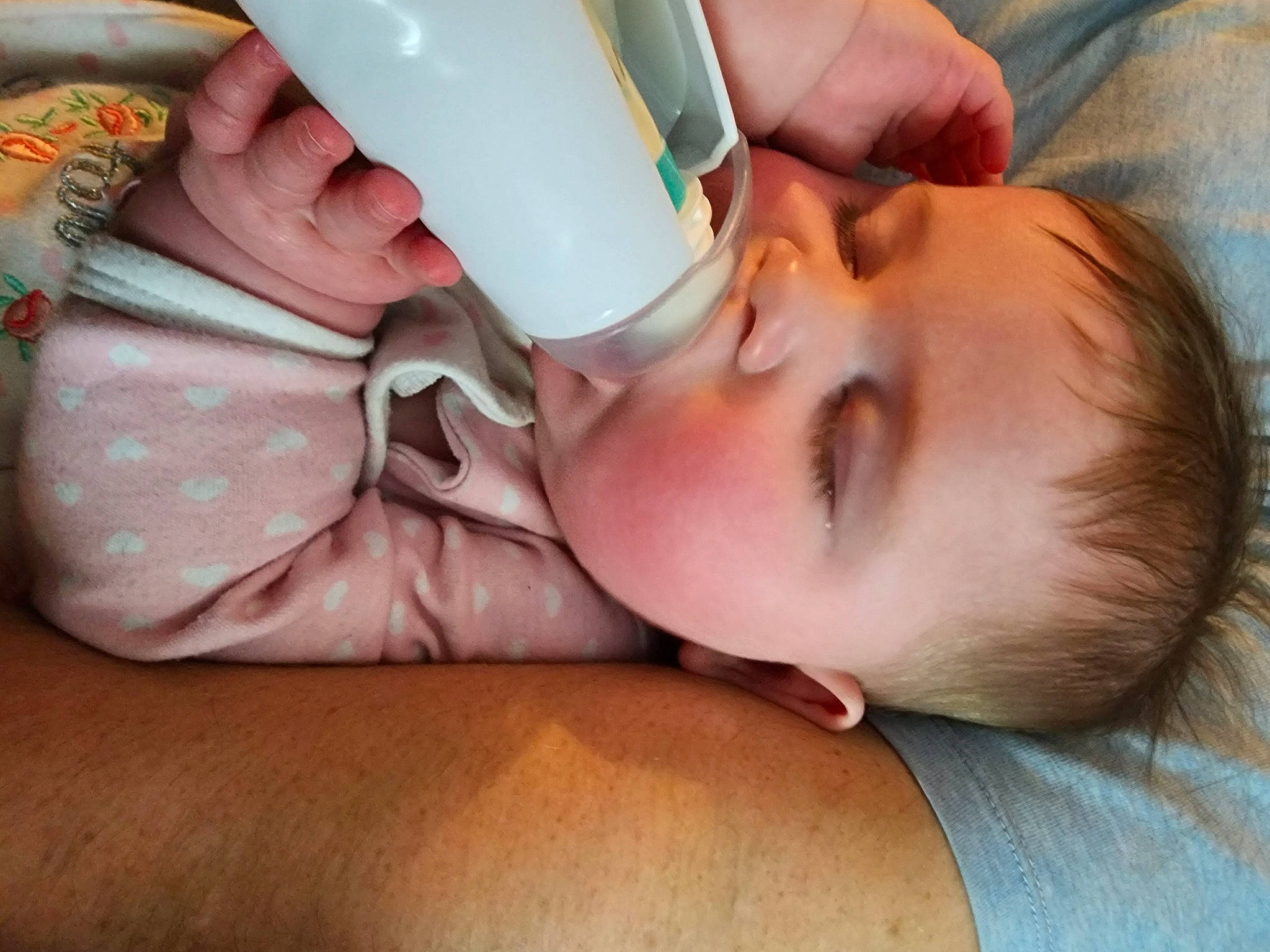 Bayleigh joined the competition — help win amazing prizes! baby, baby_toddler_clothing, child, comfort, cup, drinking, drinkware, eyelash, finger, gesture, hand, nail, nose, person, plastic_bottle, serveware, skin, tableware, toddler, wood