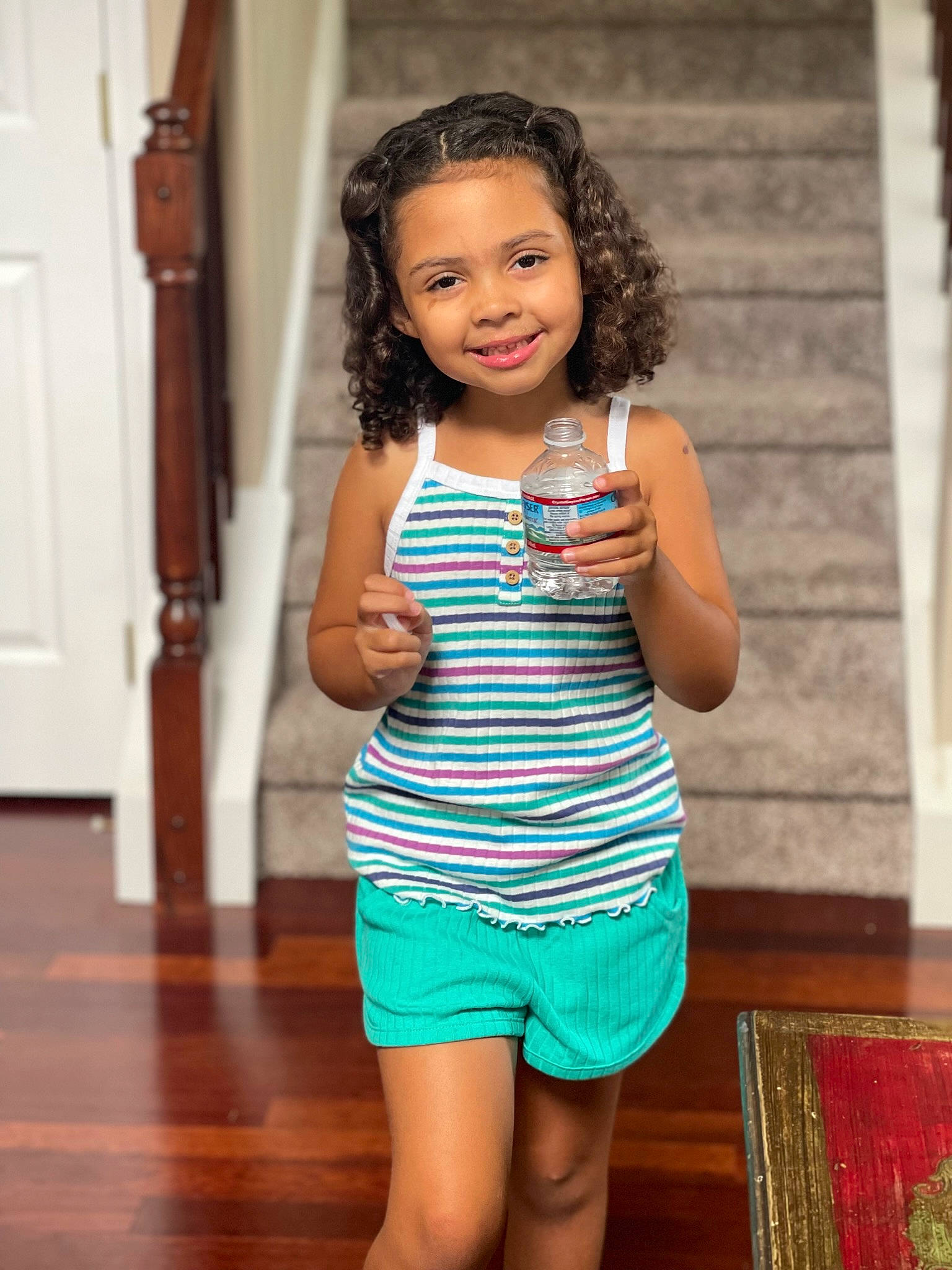 Elizabeth is registered to the contest to win money with this photo: black_hair, door, dress, eye, face, facial_expression, fashion_design, flash_photography, hair, hairstyle, happy, head, joy, long_hair, neck, person, shoulder, sleeve, smile, thigh