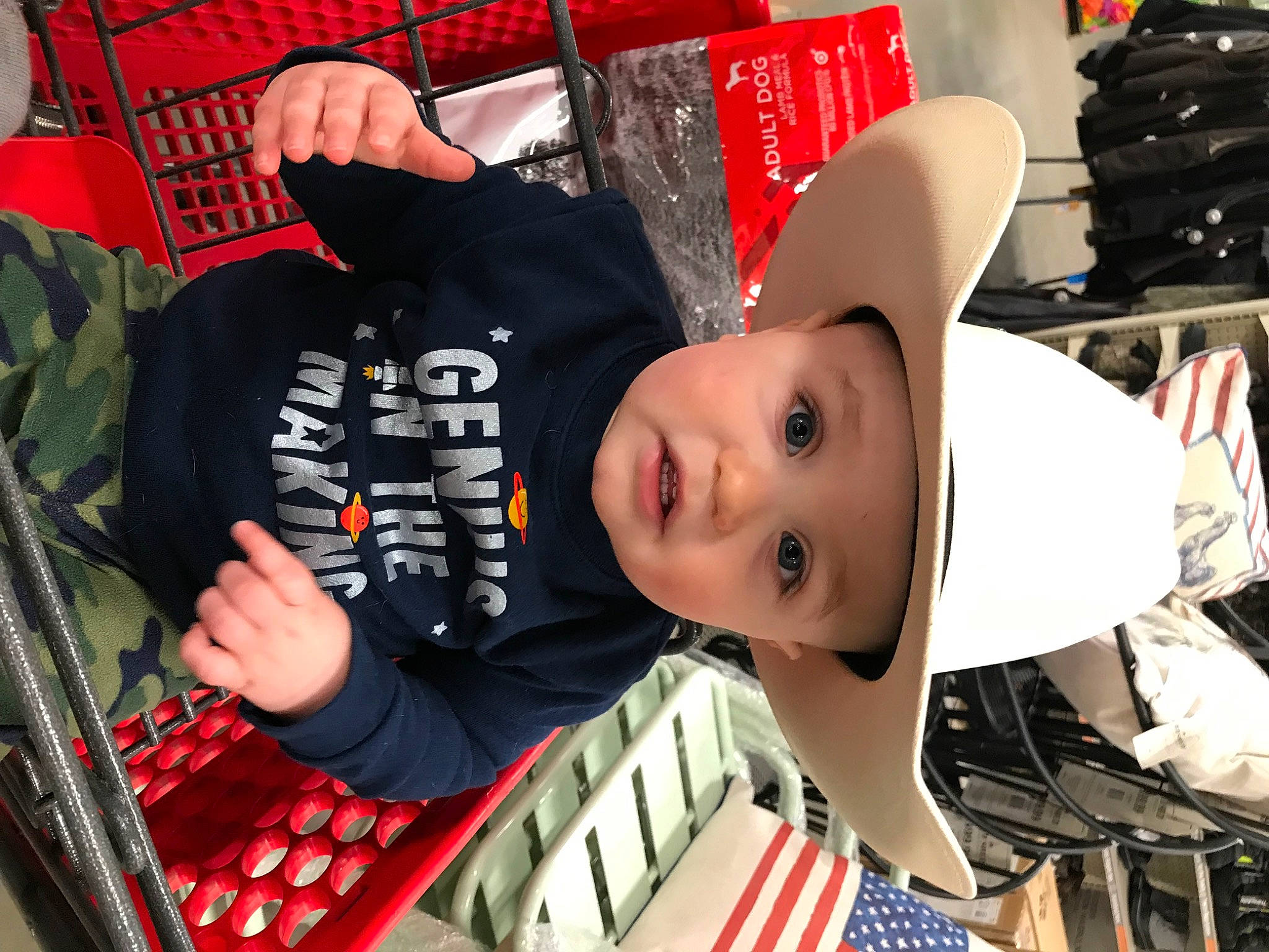 Archer is registered to the contest to win money with this photo: auto_part, automotive_design, automotive_exterior, automotive_tire, automotive_wheel_system, bumper, cap, carmine, child, fashion, fashion_accessory, fun, hat, headwear, motor_vehicle, person, personal_protective_equipment, retail, room, t_shirt