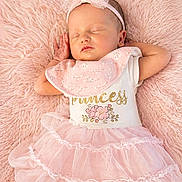 Lily is registered to the contest to win money with this photo: baby, sleeping, pink, tutu, headband, blanket, dress, infant, cute, child, soft, peaceful, adorable, portrait, resting, fashion, delicate, young, face, hands
