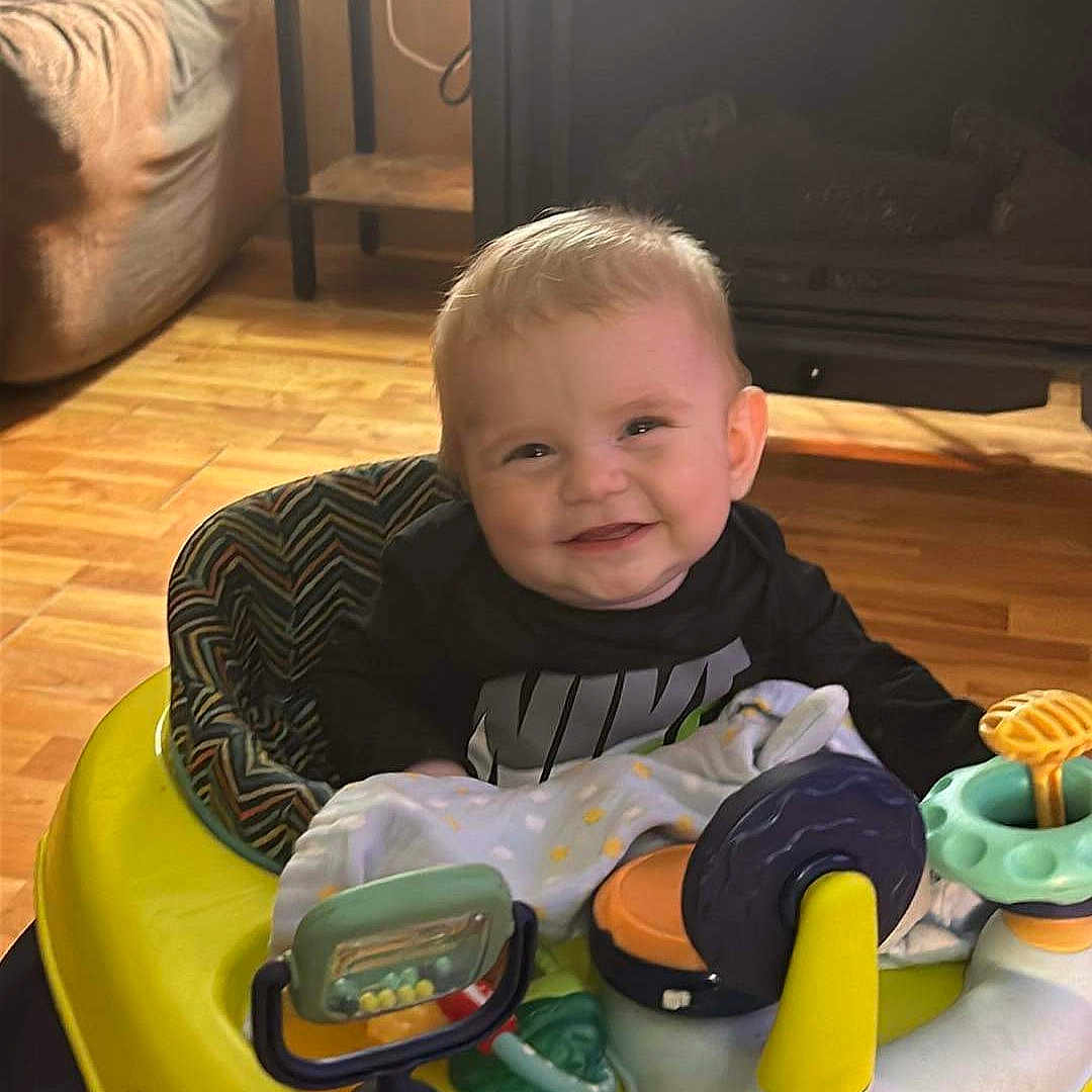 Weston Dean Hutzell is registered to the contest to win money with this photo: animal, architecture, baby, building, canine, couch, dog, face, furniture, head, indoors, lamp, livingroom, person, pet, photography, plant, portrait, room, table