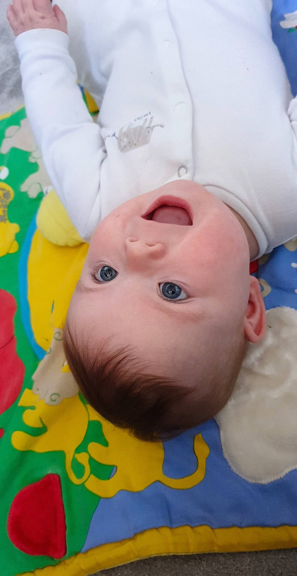 Elora is registered to the contest to win money with this photo: baby, baby_products, baby_toddler_clothing, cheek, child, eye, face, fun, gesture, grass, happy, hat, leisure, nose, person, skin, toddler, white, yellow